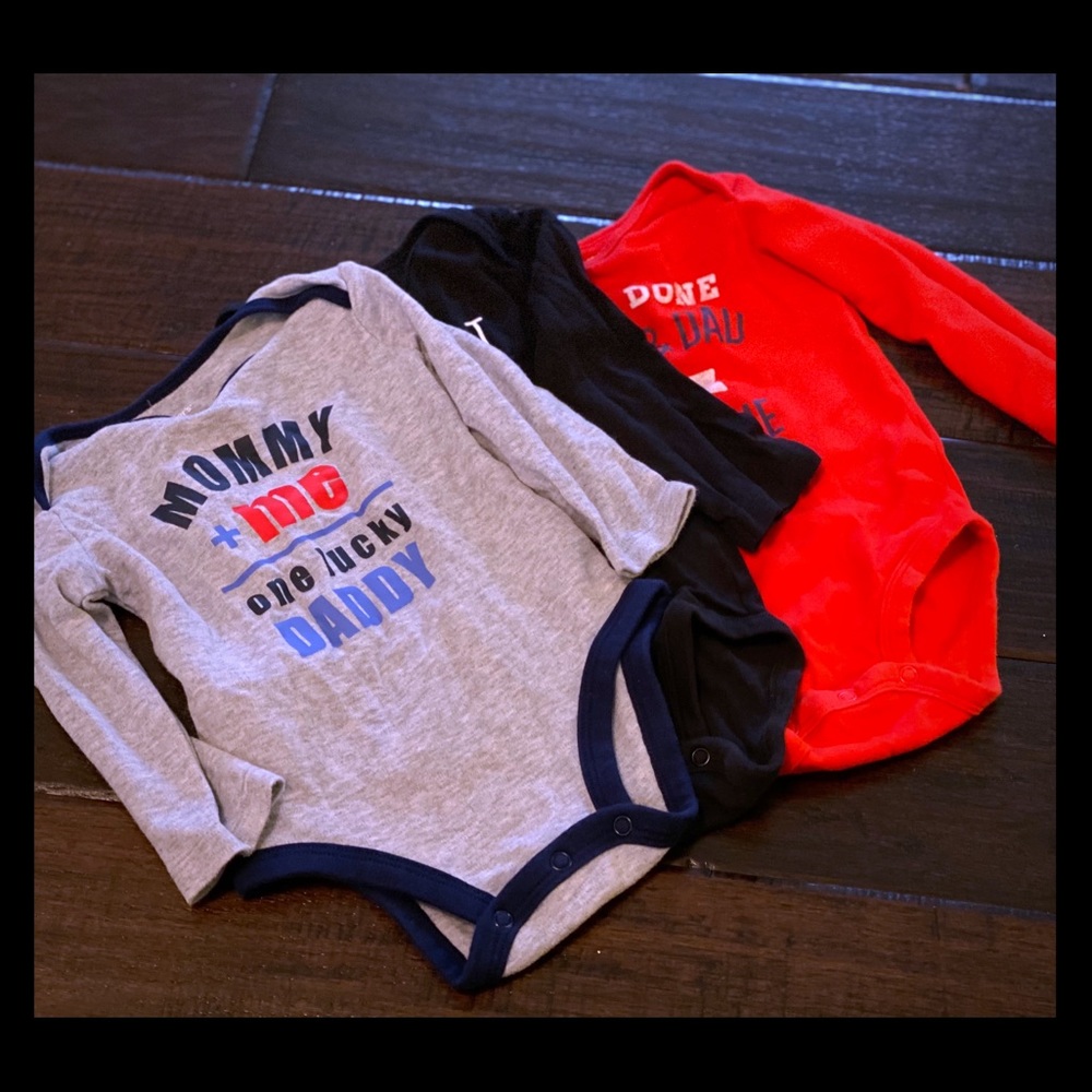 Three piece set of long sleeve onesies.
